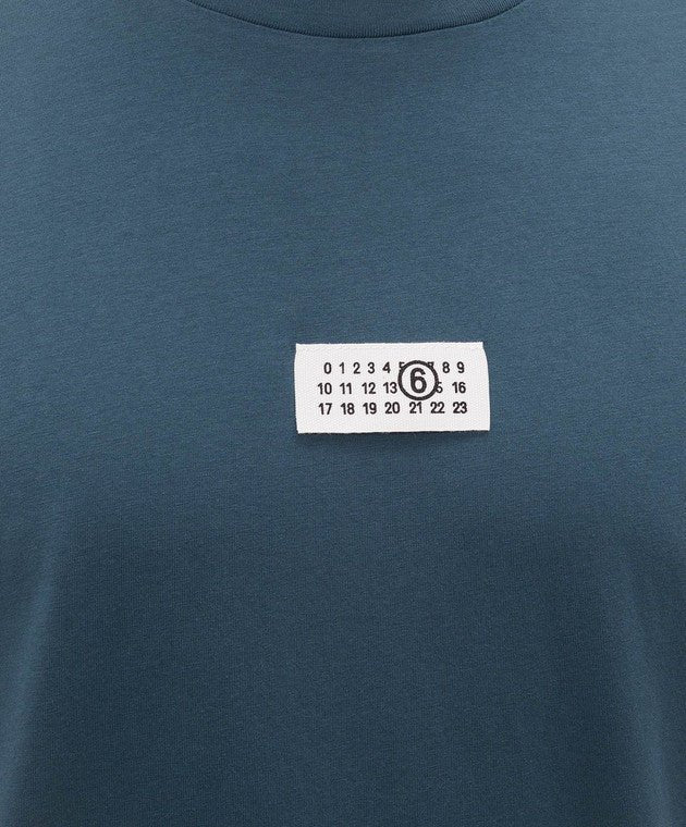 T-shirt Blu petrolio con etichetta "numeric" - YES SHOPT-shirtMM6 MAISON MARGIELASH0GC0071M20258-XXS3572075569871