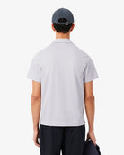 Polo con collo bowling grigio ghiaccio - YES SHOPPoloLACOSTEDH5928-XXS5820685344771