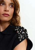 Polo Joline nera in filo con applicazioni sulle spalle - YES SHOPPoloESSENTIELJOLINE-XXS