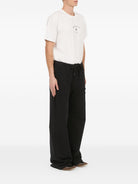 Pantalone in felpa neri con logo - YES SHOPPantaloniMM6 MAISON MARGIELASH2KA0068 M25014 900-XXS3751331776771