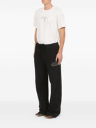 Pantalone in felpa neri con logo - YES SHOPPantaloniMM6 MAISON MARGIELASH2KA0068 M25014 900-XXS3751331776771