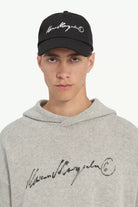 Cappello da baseball nero con logo firma - YES SHOPCappelliMM6 MAISON MARGIELAS52TC0068M13320-Taglia unica9882075569871