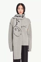 Sciarpa in lana grigia con logo - YES SHOPSciarpeMM6 MAISON MARGIELAS52TZ0064M13288-Taglia unica1192075569871