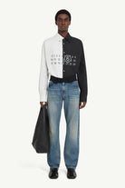 Jeans con vita ricostruita in nero - YES SHOPJeansMM6 MAISON MARGIELASH0LA0032M30055961-W253672305742771