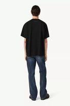 T-shirt nera con mini logo in gomma - YES SHOPT-shirtMM6 MAISON MARGIELASH2GC0051M20048-XXS7362075569871
