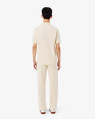 Pantaloni in tuta beige in piqué con bordo - YES SHOPPantaloni tutaLACOSTEXH0628-00-XXS7988189703771